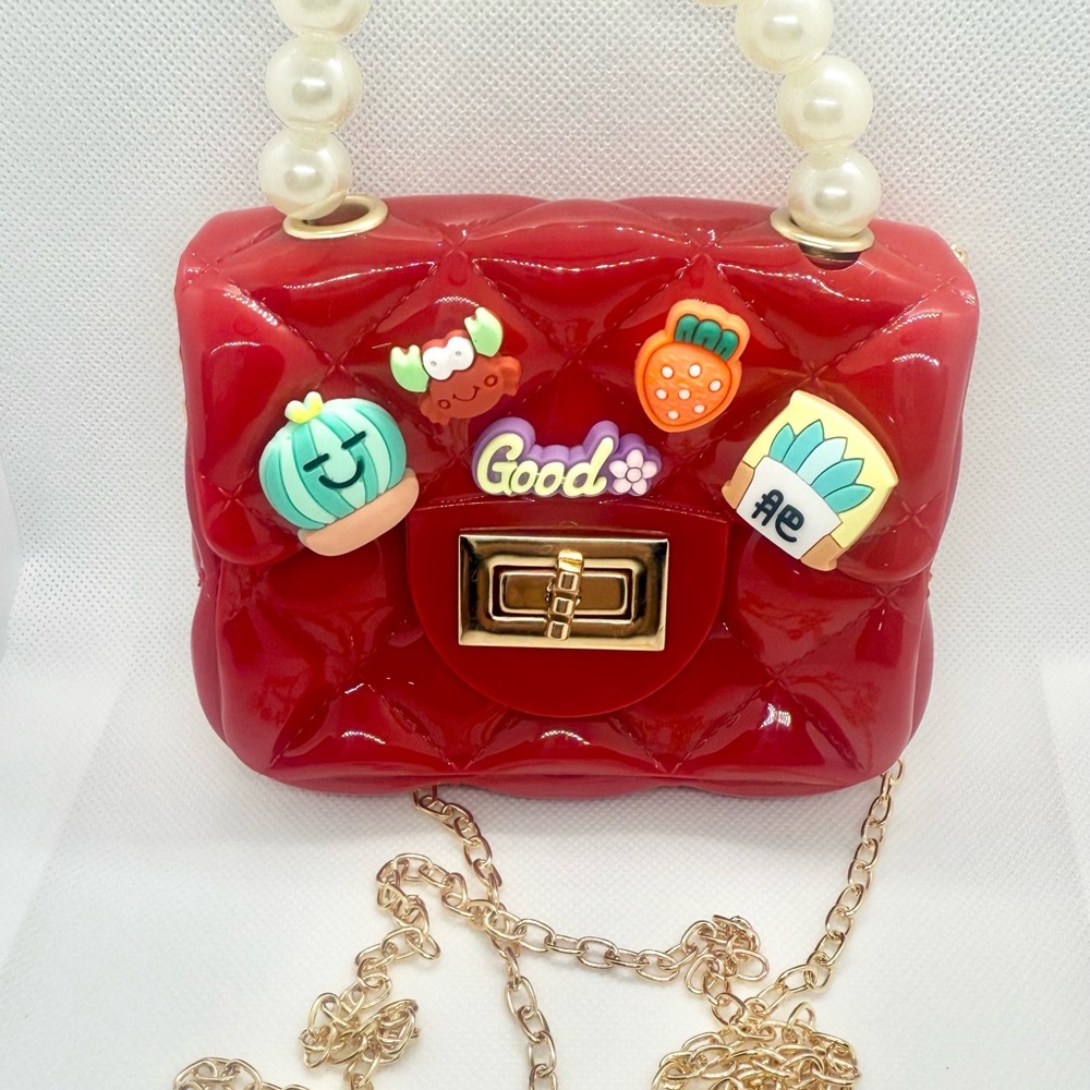 Red Quilted Women's Bag with Pearl Handle and Gold Plated Shoulder Strap.